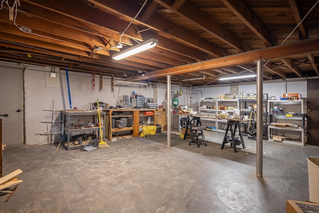 basement with a workshop area