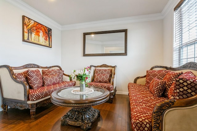 sitting room with crown molding and dark hardwood / wood-style floors