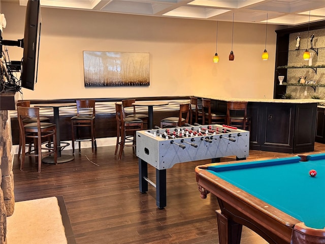 recreation room featuring beamed ceiling, pool table, bar area, coffered ceiling, and dark hardwood / wood-style flooring