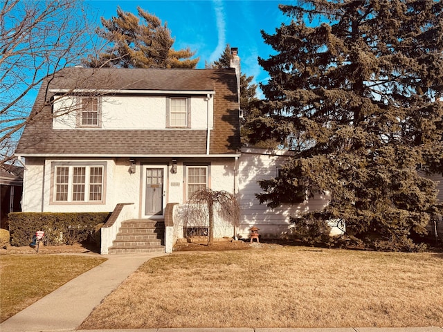 view of front of home with a front yard