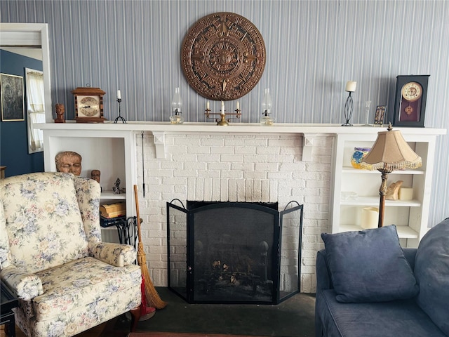 living room with a fireplace and built in shelves