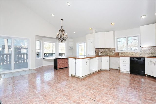 kitchen with tasteful backsplash, white cabinetry, decorative light fixtures, and black dishwasher