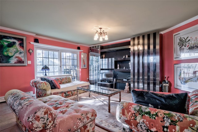 living room with ornamental molding, a chandelier, and a baseboard radiator