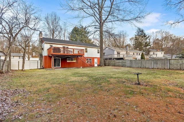 view of yard with a wooden deck