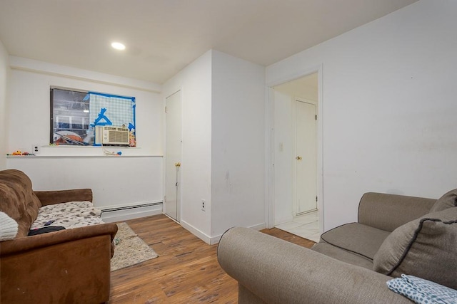 75 Tennyson Dr, Nanuet, NY 10954 - living room featuring light wood-type flooring and a baseboard radiator
