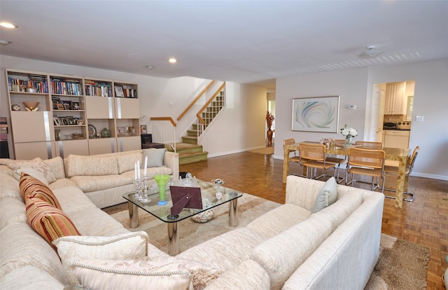 living room with parquet flooring