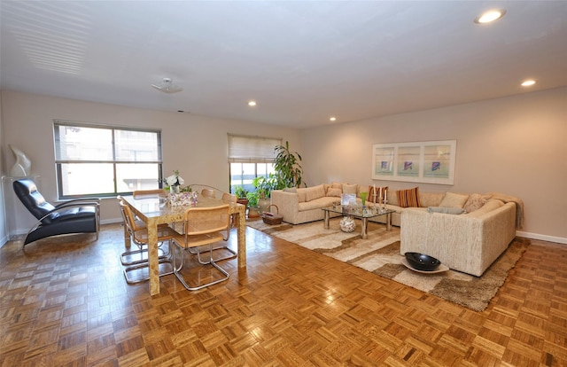 living room featuring parquet flooring