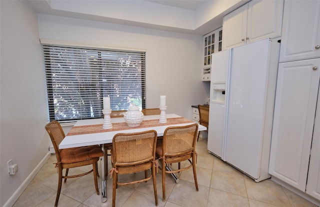 view of tiled dining space