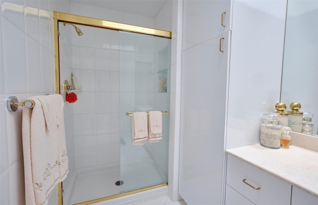 bathroom featuring a shower with door