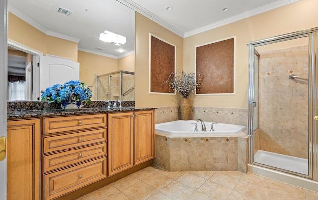 bathroom featuring independent shower and bath, crown molding, tile patterned floors, and vanity