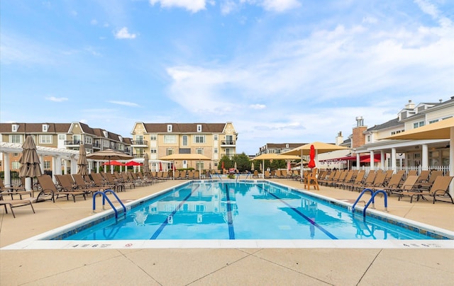 view of pool featuring a patio area