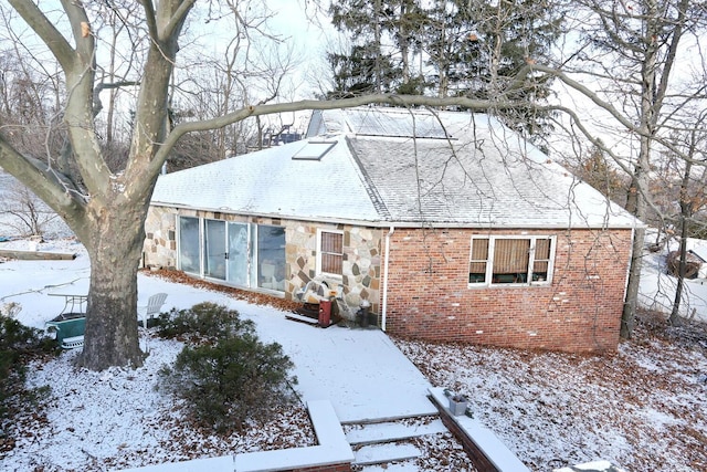 view of snow covered property