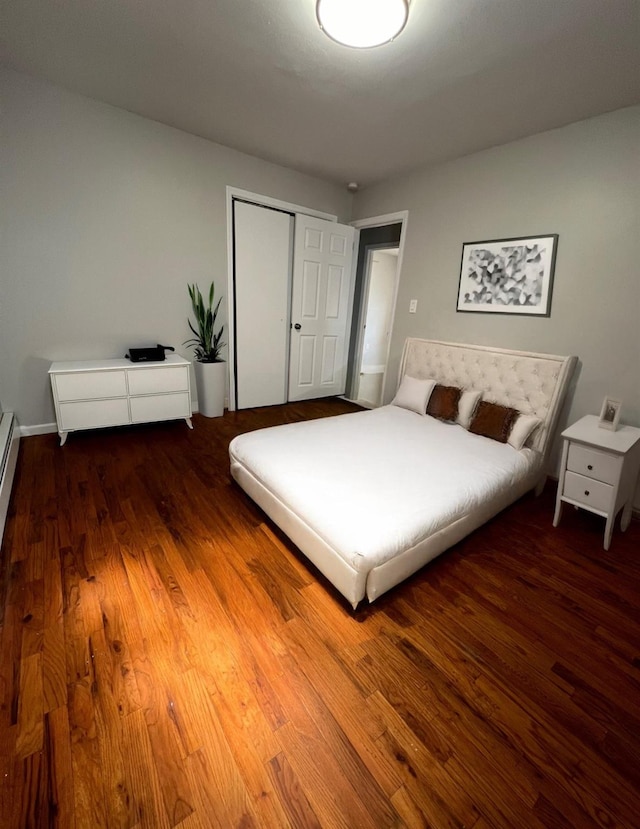 bedroom featuring hardwood / wood-style flooring