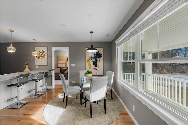 dining room featuring light wood-type flooring