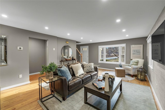 living room with light hardwood / wood-style floors