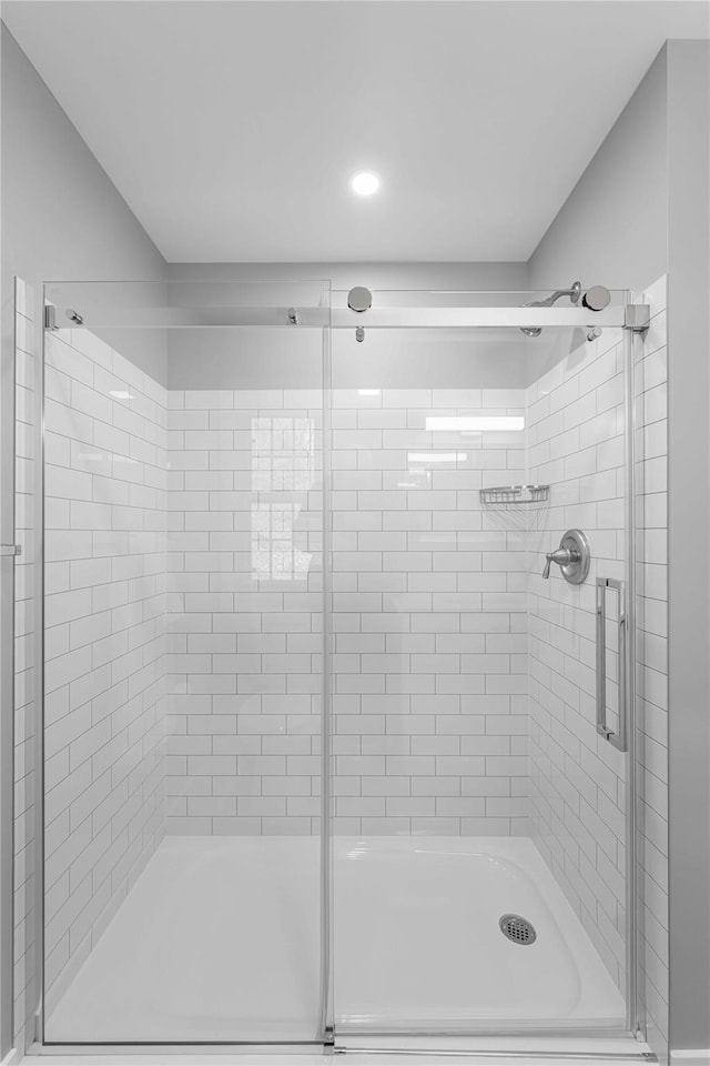 bathroom featuring an enclosed shower