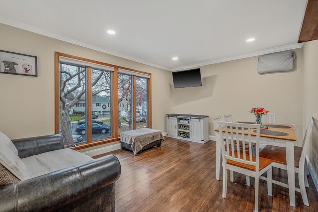 living room with crown molding and dark wood-type flooring