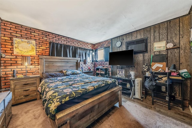 carpeted bedroom with wooden walls