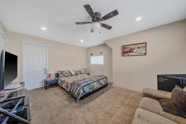 bedroom featuring ceiling fan and carpet