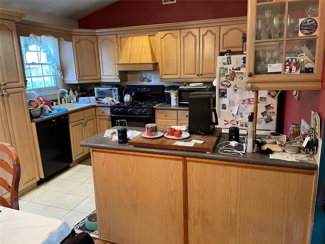 kitchen featuring premium range hood, lofted ceiling, sink, light tile patterned floors, and black appliances