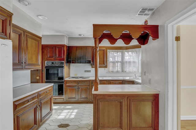 kitchen featuring sink and white appliances