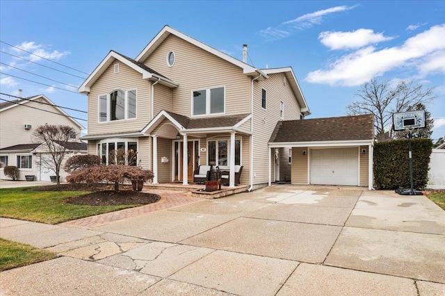 front of property with a garage