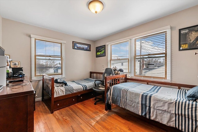 bedroom featuring light hardwood / wood-style floors