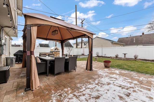 view of patio / terrace featuring a gazebo, area for grilling, and grilling area