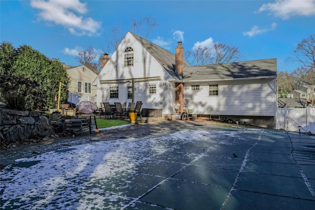 rear view of property with a patio area