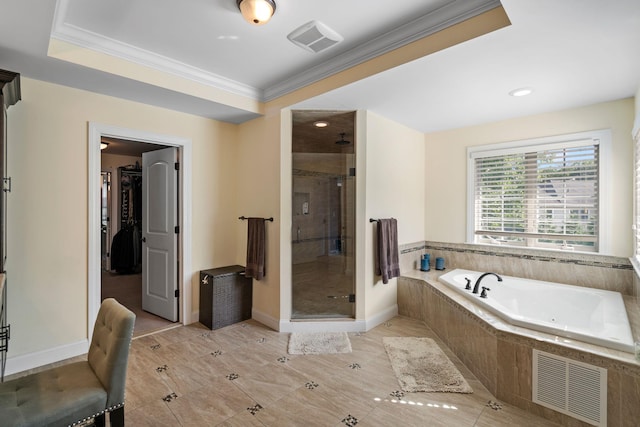 bathroom with independent shower and bath and ornamental molding