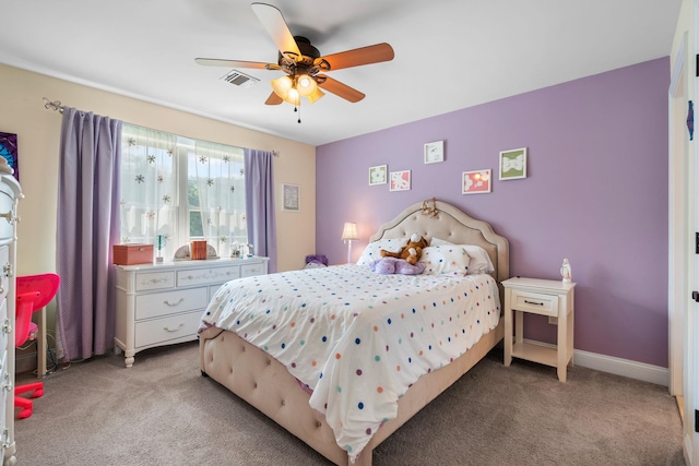 bedroom featuring light carpet and ceiling fan