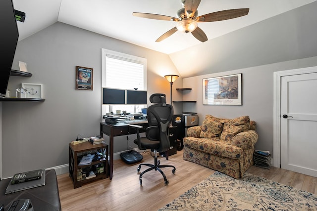 office area with ceiling fan, light hardwood / wood-style flooring, and vaulted ceiling