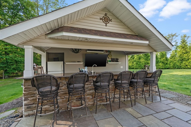 view of patio / terrace with a wet bar