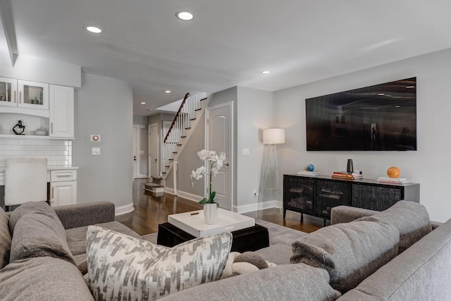 living room featuring dark hardwood / wood-style flooring