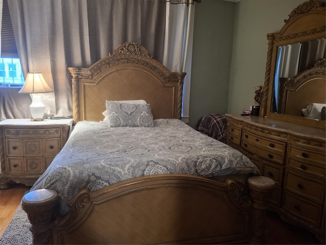 bedroom featuring wood-type flooring