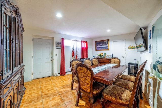 dining room with light parquet floors