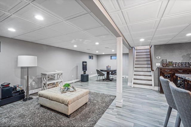 living room with hardwood / wood-style flooring and baseboard heating