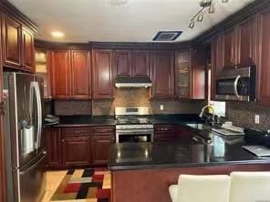 kitchen with sink and stainless steel appliances