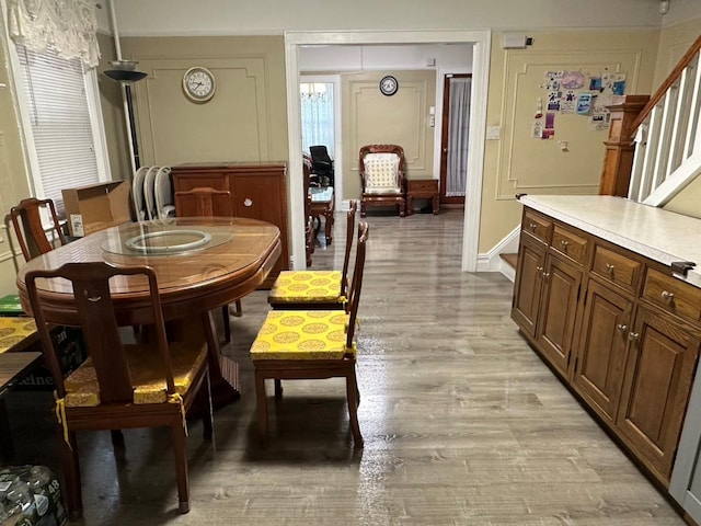 dining room featuring light hardwood / wood-style flooring