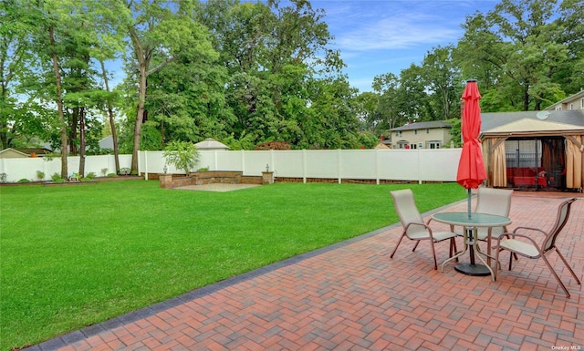 view of patio / terrace featuring a gazebo and a fenced backyard