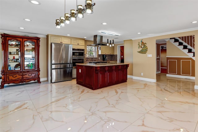 kitchen with island range hood, marble finish floor, ornamental molding, freestanding refrigerator, and tasteful backsplash