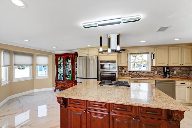 kitchen featuring tasteful backsplash, visible vents, island range hood, marble finish floor, and stainless steel appliances