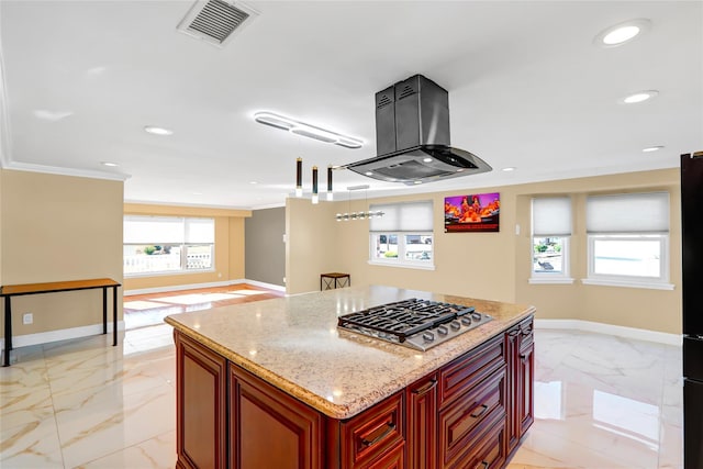 kitchen with visible vents, baseboards, marble finish floor, island exhaust hood, and stainless steel gas stovetop