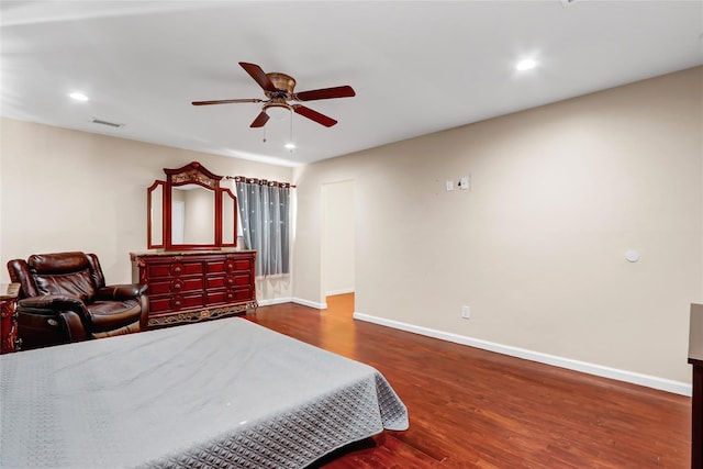 bedroom with recessed lighting, visible vents, ceiling fan, wood finished floors, and baseboards