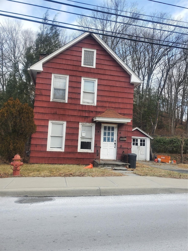 view of front facade featuring an outdoor structure