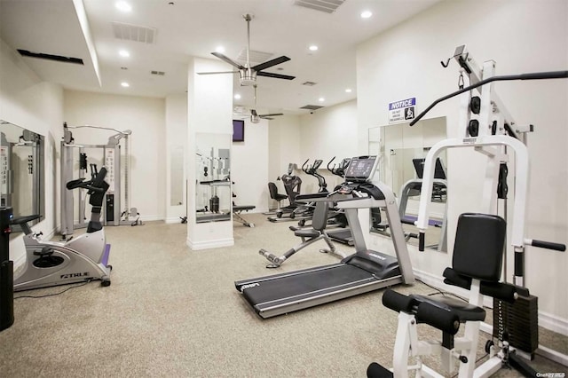 exercise room with ceiling fan