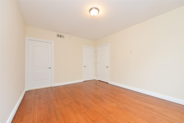 empty room featuring light wood-type flooring