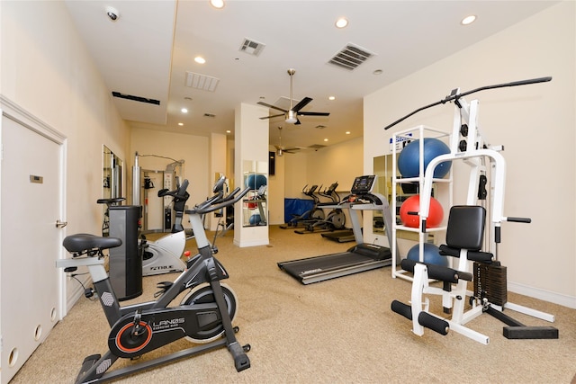 exercise room with ceiling fan