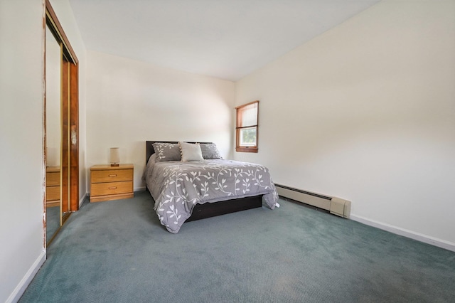 carpeted bedroom with a closet and a baseboard radiator