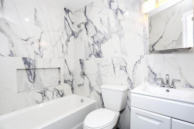 bathroom featuring tile walls, vanity, and toilet